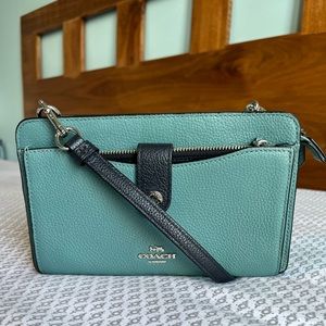 Coach Noa pop up messenger handbag. Muted Teal and Navy Blue.